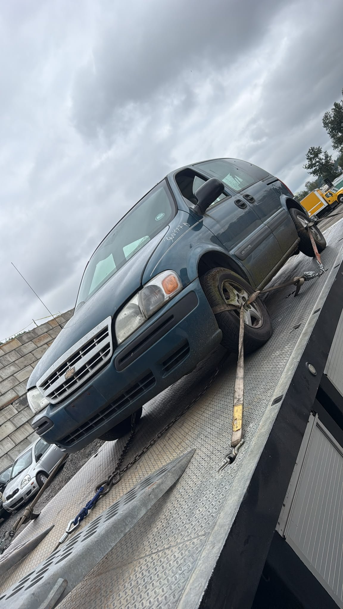 Tow truck loading an unwanted vehicle in Surrey, British Columbia